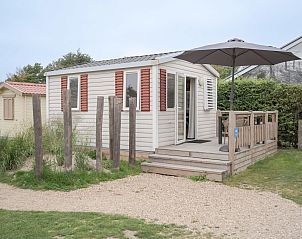 Mobil home the Cormorant in Ouddorp, Goeree-Overflakkee, South Holland with charming terrace and natural surroundings.