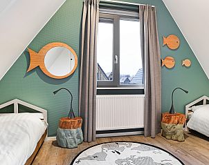 Gezellige woonkamer in De Reeuwijkse Plassen, 4-persoons kinderwoning in Zuid-Holland.