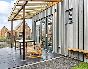 Terras met uitzicht in De Reeuwijkse Plassen, 4-persoons kinderwoning in het Groene Hart.