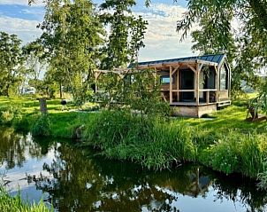 Huisje in Haastrecht, idyllisch vakantieverblijf in Groene Hart, Zuid-Holland omringd door natuur.
