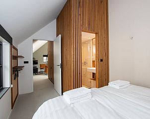 Moderne slaapkamer in Huisje in Aarlanderveen, vakantiehuis in het Groene Hart van Zuid-Holland.