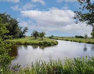 Prachtig uitzicht op water en natuur vanuit Vakantiehuis in Aarlanderveen.