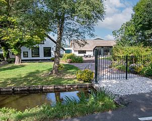 Huisje in Aarlanderveen, een charmant vakantiehuis in het Groene Hart van Zuid-Holland, omringd door natuur en rustgevende waterpartijen.