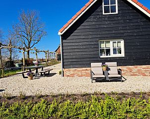 Terras met zitgelegenheid bij Vakantiehuis in Bergambacht, Zuid-Holland.