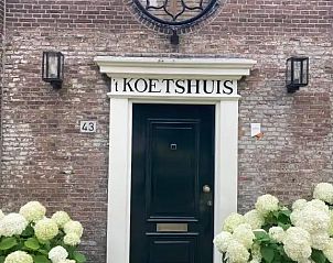 Guest house 681201 - Holiday property Noordzeekust - Koetshuis aan het water