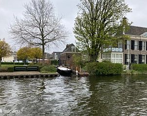 Guest house 681201 - Holiday property Noordzeekust - Koetshuis aan het water