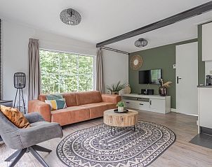 Gezellige woonkamer in Bungalow Goeree, Ouddorp. Comfortabel vakantiehuis op Goeree-Overflakkee, Zuid-Holland.