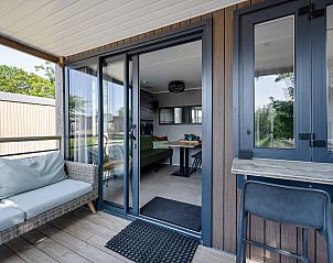 Veranda of Mobil home Beachhome in Ouddorp, ideal for relaxation in the fresh air of Goeree-Overflakkee, South Holland.