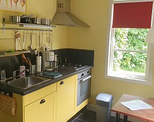 Practical kitchen in Holiday Home in Oostvoorne, ideal for self-catering vacations.