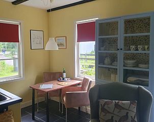 Dining area in Holiday home in Oostvoorne, perfect for cozy meals in South Holland.
