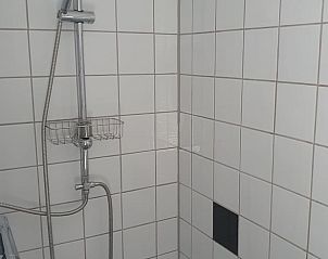 Stylish shower in Holiday Home in Oostvoorne, ideal for a refreshing start to the day.