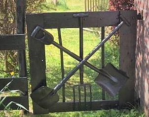 Unique garden gate at Holiday home in Oostvoorne, South Holland, with rural charm.