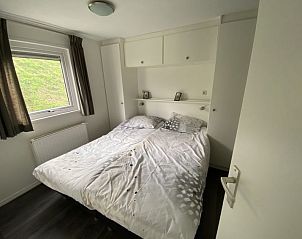 Comfortabele slaapkamer in Vakantiehuis Berkel Sauna 4, Dordrecht, Rotterdam, met tweepersoonsbed.