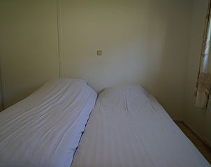 Comfortabele slaapkamer in Chalet in Dordrecht, Rotterdam, Zuid-Holland.