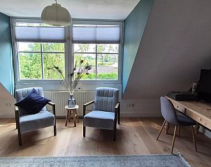 Lichte werkruimte in Vakantiehuis in Overasselt, Rijk van Nijmegen.